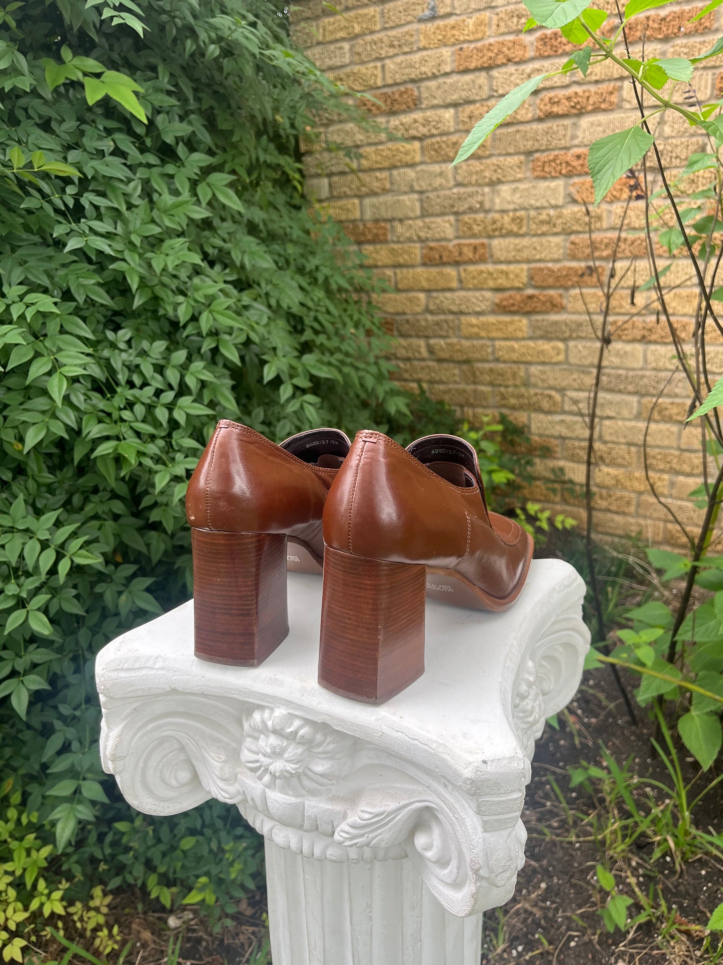 90s leather moto vest + platform loafers for candace